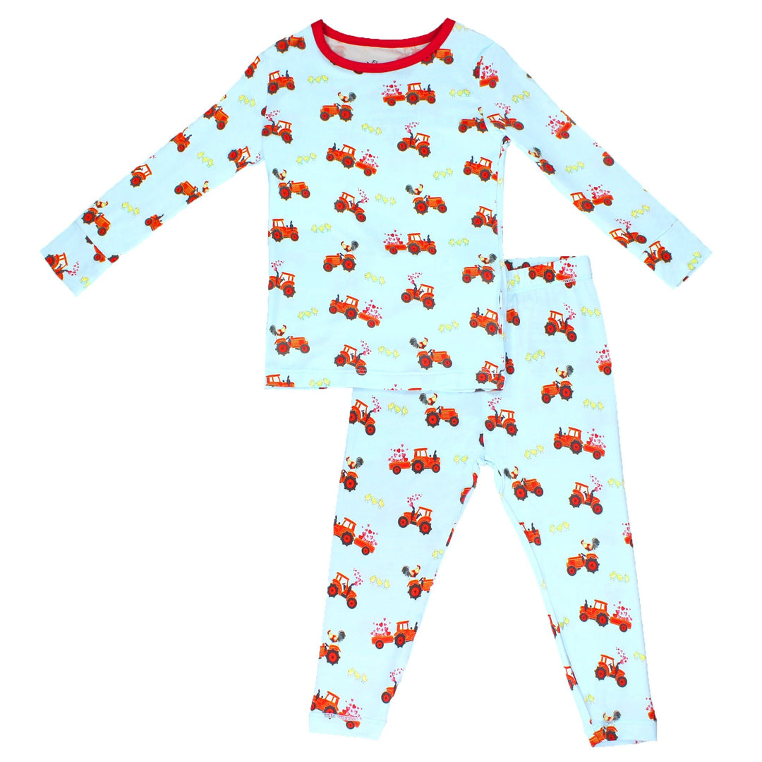 kid pajama set featuring a red tractor print