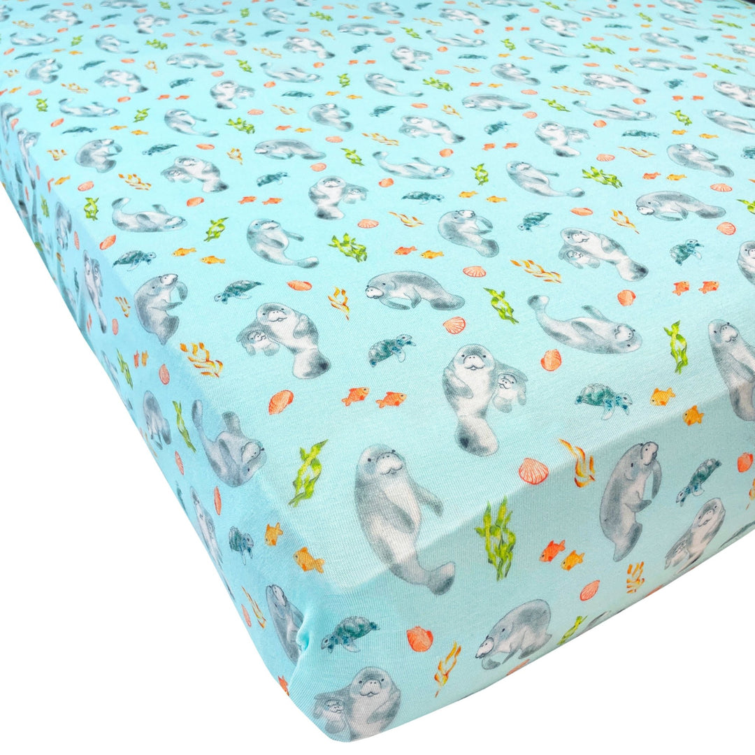 Get Your Float on Manatees Twin Fitted Sheet (w elastic straps to keep the sheet in place)